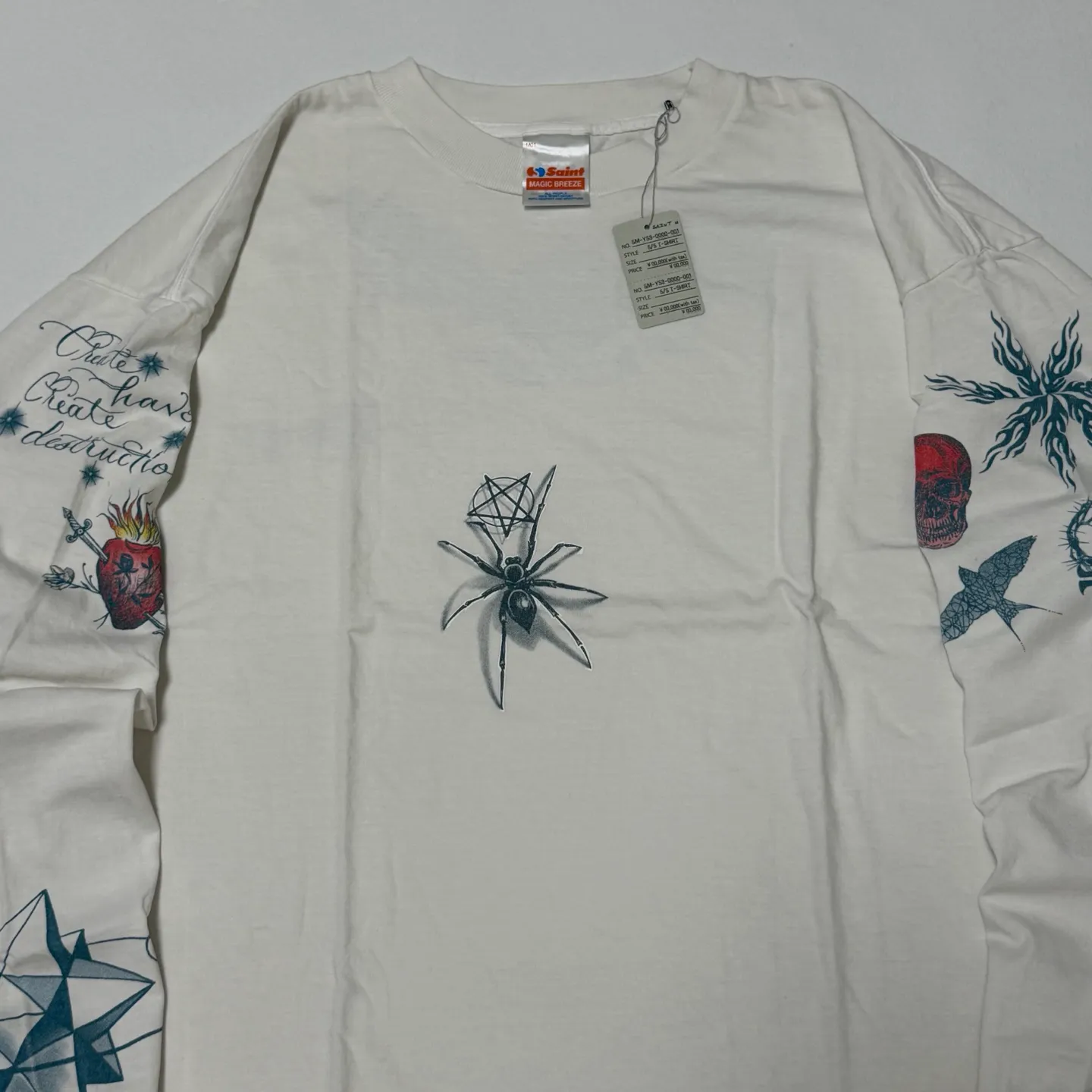 SAINT Mxxxxxx × Dr. Woo DW_LS TEE/TATTOO/WHT Dr.Woo joint model TATOO tattoo long sleeve off-white S-XL OE yarn Tube weaving high weight fabric without side seams Original printing water slurry process No touch printing Breathable and comfortable Original level replica printing Correct version Correct main mark/wash mark/cherub anti-counterfeiting mark